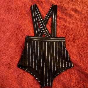 Striped Black and Gold high waisted shorts with suspenders. Size Small.